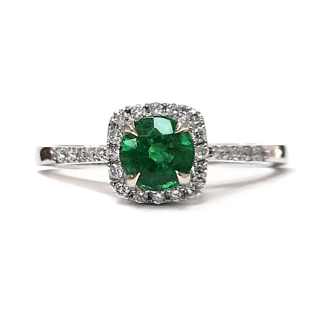 Пръстен със смарагд 0,63 к. и диаманти от бяло злато 14 к.