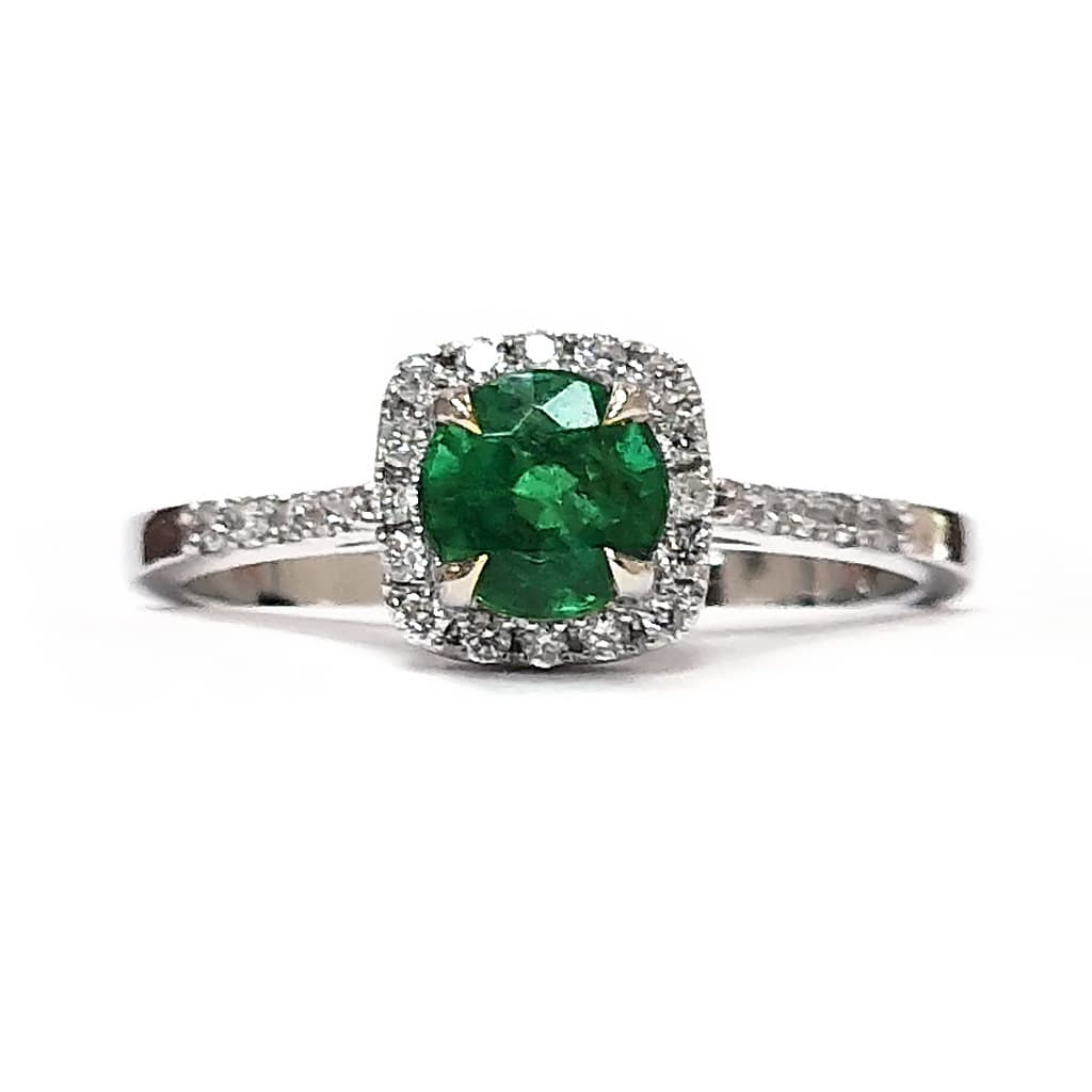 Пръстен със смарагд 0,63 к. и диаманти от бяло злато 14 к.